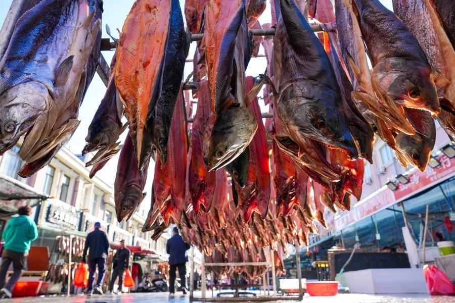 ลัดเลาะ 'ตลาดปลาตงจี๋' ในเมืองหลวงแห่งปลาน้ำจืดของจีน