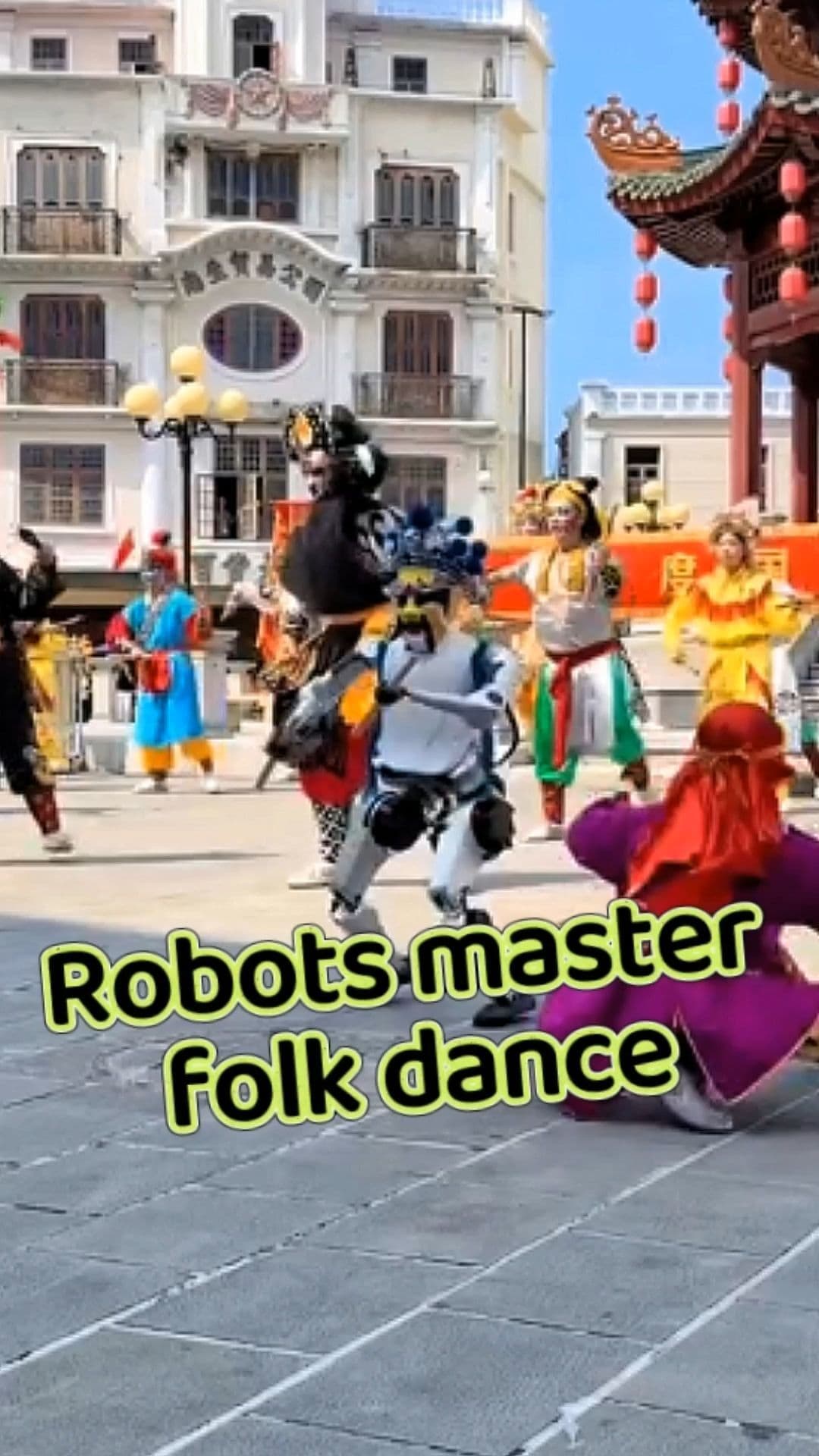 หุ่นยนต์สวมหน้ากาก-เครื่องหัวจัดเต็ม โชว์ระบำอิงเกอสุดพลิ้วในกวางตุ้ง