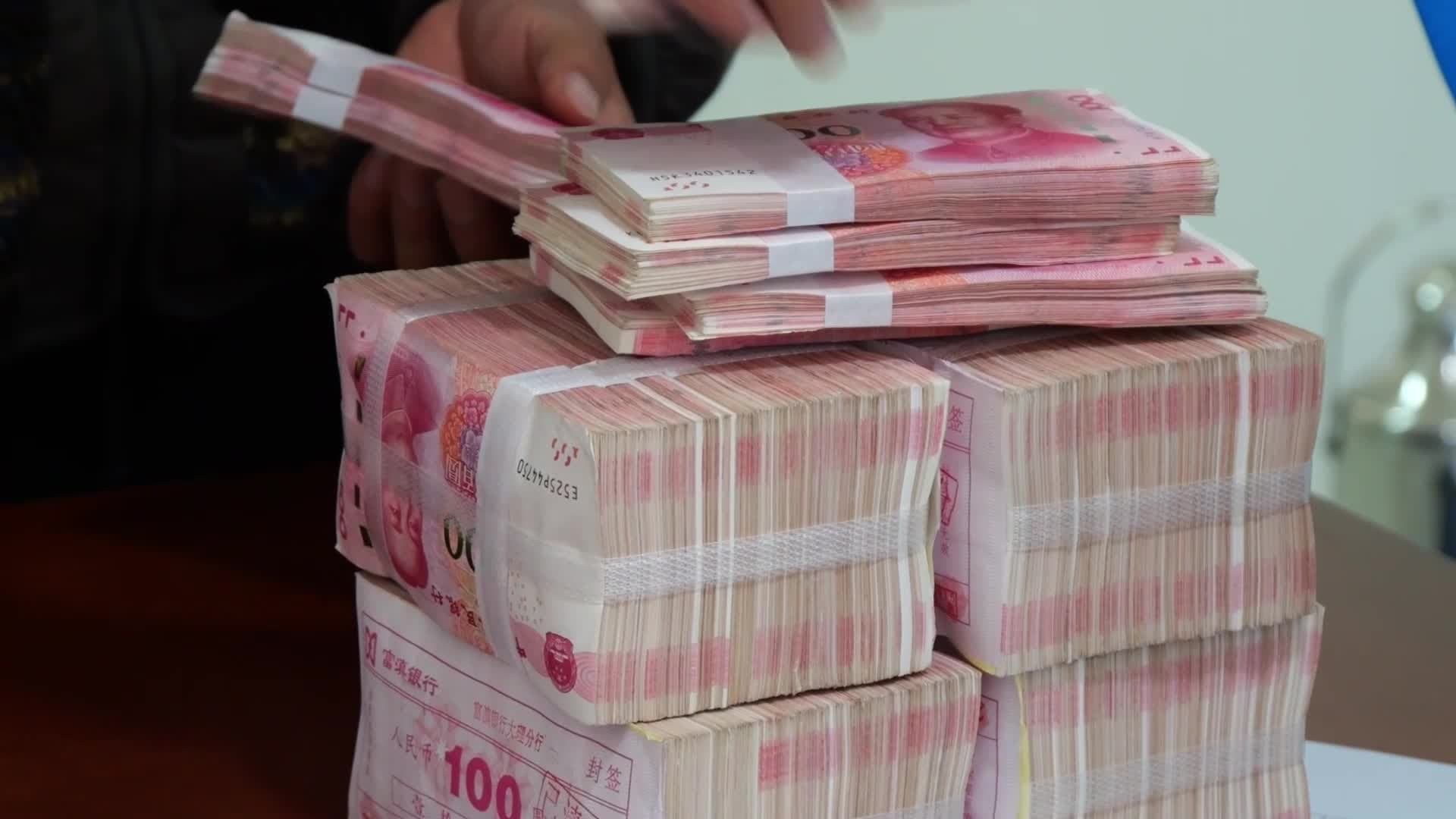 หมู่บ้านในยูนนานขนเงินสดกว่า 4 ล้านหยวน แจก 'โบนัสสิ้นปี' ก่อนหยุดตรุษจีน